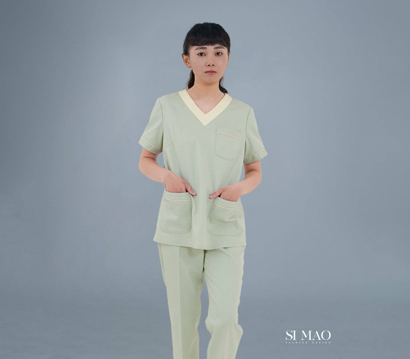 青綠V領刷手服